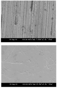 Figure 12: Scanning electron micrograph (1000X) of a ground/honed specimen (top) and an ISF surface (bottom) after processing.