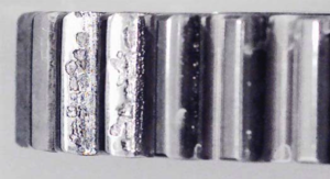 Isotropic Finishing of Helicopter and Turboprop Gearbox Components-gear tooth spalling