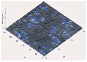 Photo 3; Shows a 3-dimensional, 20X magnified view of an ISF gear tooth. The Ra = is 1.5 μinches. The surface has been produced by chemically accelerated vibratory finishing. Note the elimination of the directional surface asperities (grind lines) when compared to Photo #2.