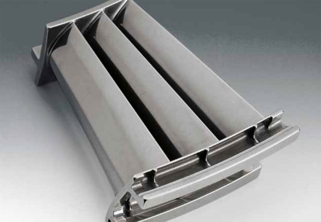 Traditionally manufactured Ti-6Al-4V compressor blade segment shown after REM's ISF Process